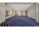 Spacious living room with natural light and wooden doors at 1252 Rosewind Cir, Castle Rock, CO 80104