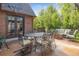 Outdoor living space offers dining area with ample seating, perfect for gatherings at 2825 E 9Th Ave, Denver, CO 80206