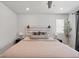 Inviting bedroom showcases a stylish headboard with sconces and plush bedding at 5297 Blue Lunar Ln, Castle Rock, CO 80104