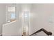 Bright hallway with natural light showcases the home's upper level at 5297 Blue Lunar Ln, Castle Rock, CO 80104