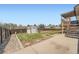 Spacious backyard features a storage shed, lawn, and a concrete patio at 1207 S Memphis St, Aurora, CO 80017