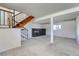 Spacious unfinished basement has carpet and a fireplace at 1207 S Memphis St, Aurora, CO 80017