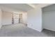 Cozy carpeted bedroom with large window at 1207 S Memphis St, Aurora, CO 80017
