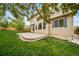 A cozy patio area in the backyard provides a perfect spot for relaxation and outdoor enjoyment at 4850 Bluegate Ln, Highlands Ranch, CO 80130