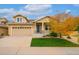 Charming single-Gathering home featuring a two-car garage and well-maintained lawn at 4850 Bluegate Ln, Highlands Ranch, CO 80130