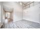 Open foyer area featuring a two-story ceiling and modern chandelier at 4850 Bluegate Ln, Highlands Ranch, CO 80130