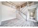 Entryway showing staircase and wood-look flooring at 4850 Bluegate Ln, Highlands Ranch, CO 80130