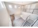 Bright living room with high ceilings, wood floors, and a modern chandelier at 4850 Bluegate Ln, Highlands Ranch, CO 80130