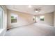 Large main bedroom featuring neutral colors and lots of natural light at 4850 Bluegate Ln, Highlands Ranch, CO 80130