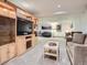 This expansive living room has carpeted floors, built-in cabinets and plenty of space for entertaining and relaxation at 9931 E Ida Pl, Greenwood Village, CO 80111