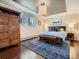 Serene bedroom with hardwood floors, stylish furnishings, and a soothing color palette at 9931 E Ida Pl, Greenwood Village, CO 80111
