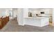 Hallway with a wooden railing and carpeted flooring at 25018 E Canal Pl, Aurora, CO 80018