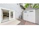 Backyard with utility shed and basement access through french doors, offering convenience and storage at 7567 Parkview Mtn, Littleton, CO 80127
