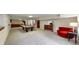 A large finished basement with a pool table, lounge chair, and built in hutch at 7567 Parkview Mtn, Littleton, CO 80127