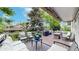 Open deck with outdoor seating, grill, and lush surroundings, perfect for outdoor gatherings at 7567 Parkview Mtn, Littleton, CO 80127