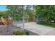 Charming home with well-maintained landscaping, a driveway, and a welcoming facade at 7567 Parkview Mtn, Littleton, CO 80127