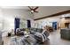 Open-concept living room with vaulted ceilings and seamlessly connecting to the kitchen at 7567 Parkview Mtn, Littleton, CO 80127
