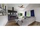 Cozy living room with a modern fireplace, vaulted ceilings, and large windows at 7567 Parkview Mtn, Littleton, CO 80127