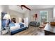 Spacious main bedroom with vaulted ceilings, a seating area, and a walk-in closet at 7567 Parkview Mtn, Littleton, CO 80127