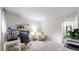 A room being used as an office featuring two desk spaces, a sitting chair, and carpeted floors at 7567 Parkview Mtn, Littleton, CO 80127