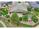 Aerial view of backyard with patio, pergola, mature trees and fence at 6652 W Asbury Pl, Lakewood, CO 80227