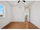 Bedroom with hardwood floors and closet at 49601 E 56Th Ave, Bennett, CO 80102