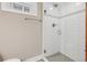 Updated bathroom featuring a shower with glass door and stylish subway tile at 815 S Gaylord St, Denver, CO 80209