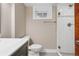 Updated bathroom features a glass shower, subway tile, and modern fixtures at 815 S Gaylord St, Denver, CO 80209