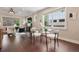 Open floor plan with dining area and a living room filled with lots of natural light at 815 S Gaylord St, Denver, CO 80209