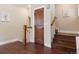 Inviting entryway with hardwood floors, wooden stairs and a wooden door at 815 S Gaylord St, Denver, CO 80209