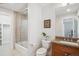 Bright bathroom featuring a glass shower door, granite countertop and decorative accents that enhances the space at 230 Hudson St, Denver, CO 80220