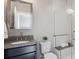 Modern bathroom featuring sleek fixtures, a spacious shower, and contemporary design elements that elevates the space at 230 Hudson St, Denver, CO 80220