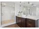 Clean, modern bathroom features sleek fixtures, and a walk-in shower with bench at 230 Hudson St, Denver, CO 80220