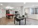 Basement dining area featuring a modern table, sleek chairs, and a stylish setup, perfect for casual meals at 230 Hudson St, Denver, CO 80220
