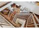 Open staircase with lots of natural light highlights the architectural design of the home at 230 Hudson St, Denver, CO 80220
