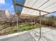 Relaxing backyard with a partially covered patio and lush greenery at 4658 E 107Th Ave, Thornton, CO 80233