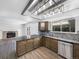 Modern kitchen with stainless steel appliances, granite countertops, and mosaic backsplash at 4658 E 107Th Ave, Thornton, CO 80233