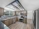 Well-lit kitchen featuring stainless steel appliances and modern backsplash at 4658 E 107Th Ave, Thornton, CO 80233