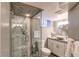Modern bathroom featuring a glass shower, updated fixtures, and stylish vanity for a spa-like experience at 6687 Devinney Ct, Arvada, CO 80004