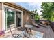 Inviting deck area with outdoor seating perfect for enjoying the serene backyard and al fresco dining at 6687 Devinney Ct, Arvada, CO 80004
