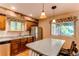 Kitchen with stainless steel appliances and a breakfast bar with seating for two at 6687 Devinney Ct, Arvada, CO 80004
