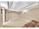 Finished basement room with columns and neutral decor at 7999 S Blackstone Pkwy, Aurora, CO 80016