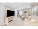 Basement media room with sectional sofa and TV at 7999 S Blackstone Pkwy, Aurora, CO 80016