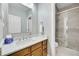 Bathroom with granite vanity and a large shower at 7999 S Blackstone Pkwy, Aurora, CO 80016