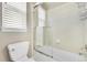 Clean bathroom, shower/tub combo, toilet and window at 7999 S Blackstone Pkwy, Aurora, CO 80016