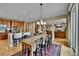 Kitchen with an eat-in island and access to the living room at 7999 S Blackstone Pkwy, Aurora, CO 80016