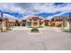Grand estate home exterior with circular driveway at 7999 S Blackstone Pkwy, Aurora, CO 80016