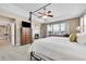 Main bedroom with fireplace and large windows at 7999 S Blackstone Pkwy, Aurora, CO 80016