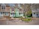 Charming townhome featuring a well-maintained lawn, lush landscaping, and convenient parking, a great outdoor view at 10735 W Dartmouth Ave, Lakewood, CO 80227