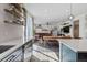 Open-concept living room featuring hardwood floors, bright natural light, and modern decor at 432 N Patsburg St, Aurora, CO 80018